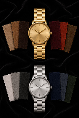 Two affordable minimalist men's watches showing a gold-tone watch and a silver-tone watch as a simple two-watch foundation.